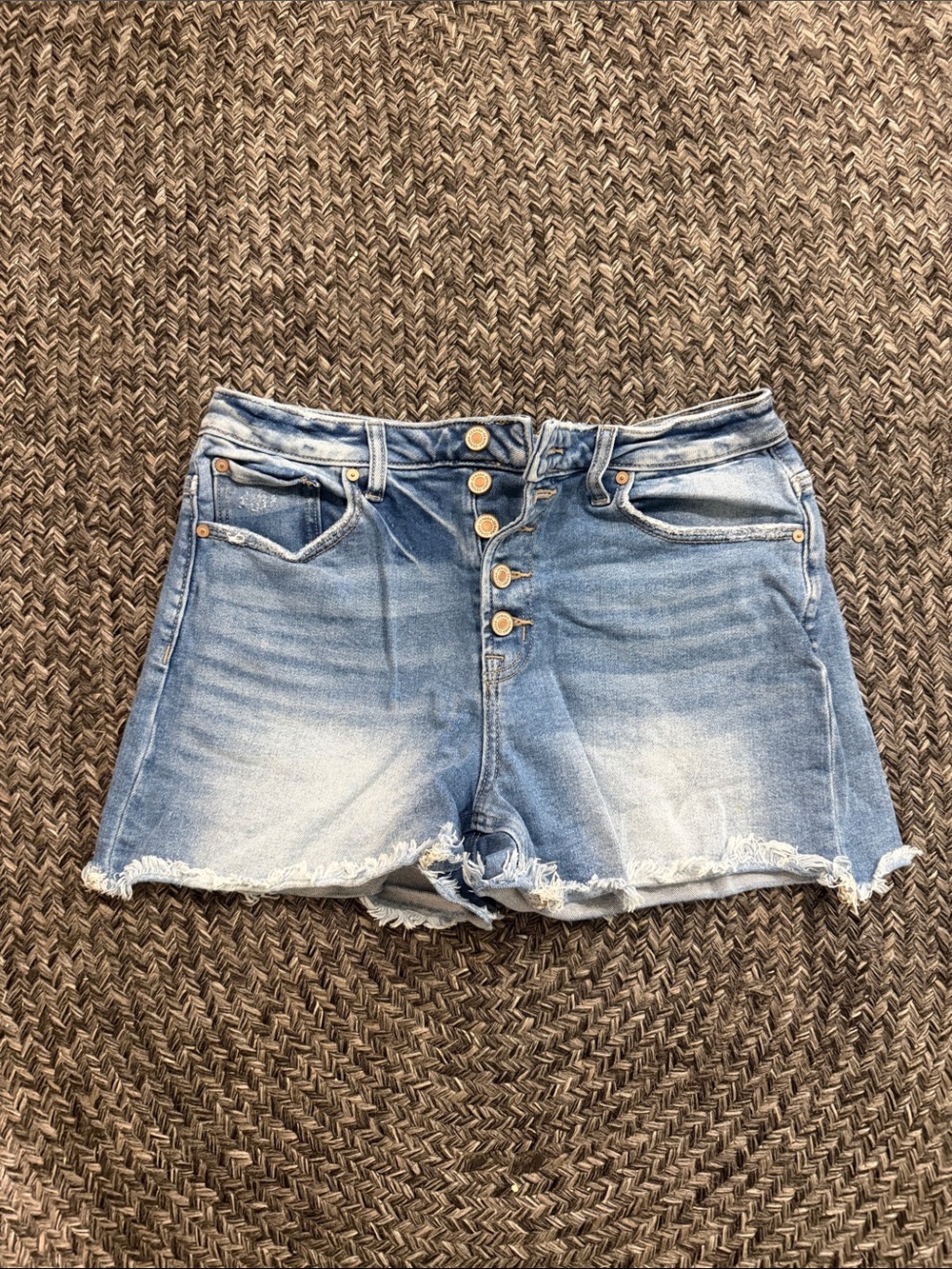 High-Rise Light Blue Distressed Denim Shorts with Button Fly